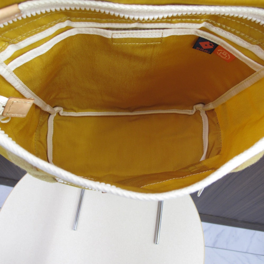 豊岡鞄 トヨオカカバン リュック by atelier NUU ナイロン イエロー レディース