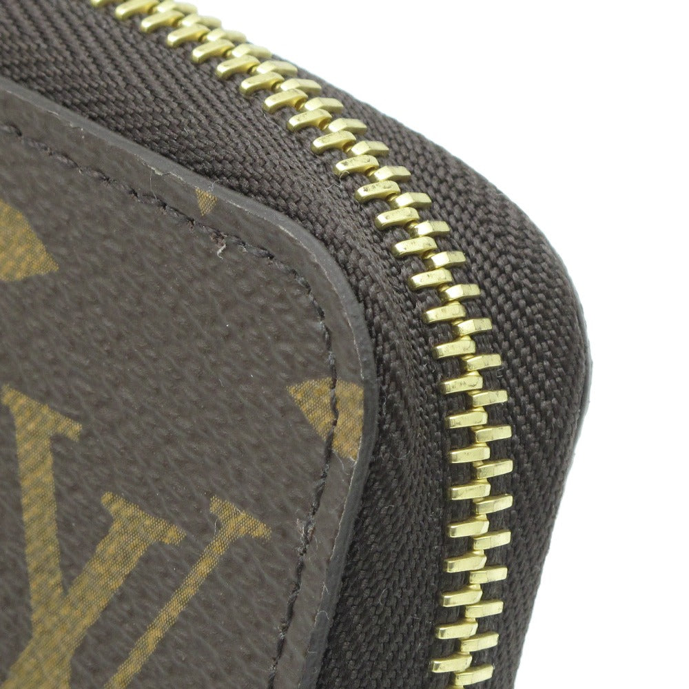 LOUIS VUITTON ルイ・ヴィトン ジッピーウォレット モノグラム フューシャ M41895 ラウンドファスナー長財布 PVC レザー ブラウン 赤紫 未使用品