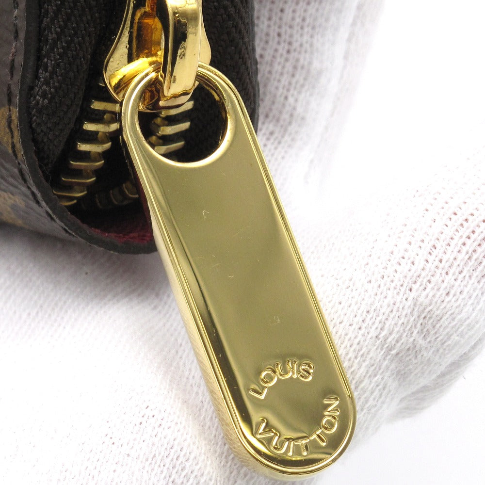 LOUIS VUITTON ルイ・ヴィトン ジッピーウォレット モノグラム フューシャ M41895 ラウンドファスナー長財布 PVC レザー ブラウン 赤紫 未使用品