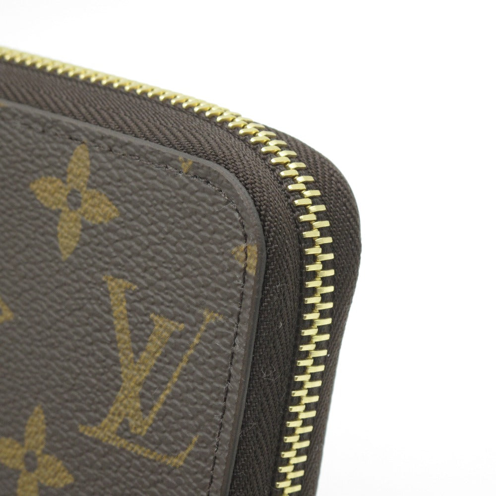 LOUIS VUITTON ルイ・ヴィトン ジッピーウォレット モノグラム フューシャ M41895 ラウンドファスナー長財布 PVC レザー ブラウン レディース 未使用品