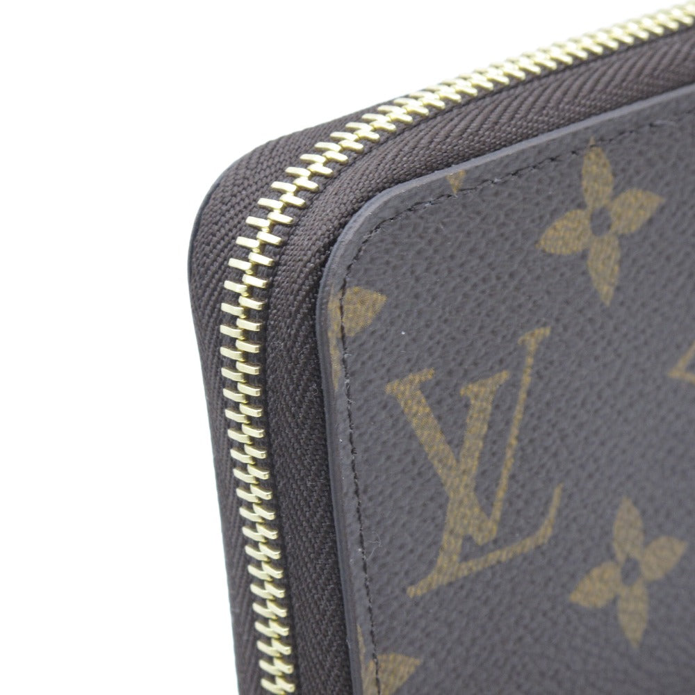 LOUIS VUITTON ルイ・ヴィトン ジッピーウォレット モノグラム フューシャ M41895 ラウンドファスナー長財布 PVC レザー ブラウン レディース 未使用品