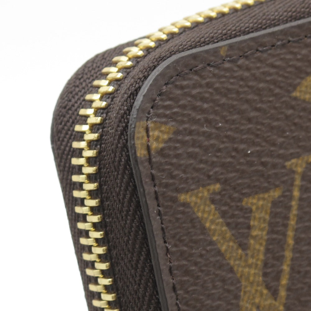 LOUIS VUITTON ルイ・ヴィトン ジッピーウォレット モノグラム M41895 フューシャ ラウンドファスナー長財布 PVC レザー ブラウン 赤紫 未使用品