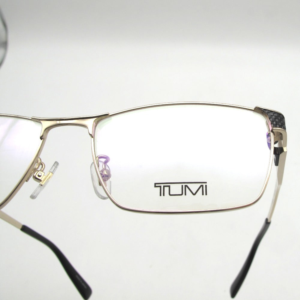 TUMI トゥミ サングラス メガネフレーム スクエア チタン製 ゴールド ブラック プラスチックモダン COL.0300 56-16-145 日本製 クロス ケース付き アイウェア VTU039J