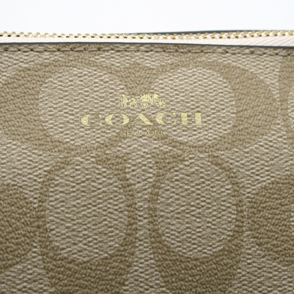 COACH コーチ シグネチャー柄 ポーチ ケース F53385 メイク コスメ 化粧 PVC ベージュ レディース 美品