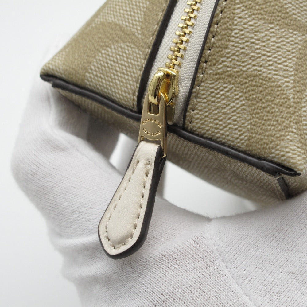 COACH コーチ シグネチャー柄 ポーチ ケース F53385 メイク コスメ 化粧 PVC ベージュ レディース 美品