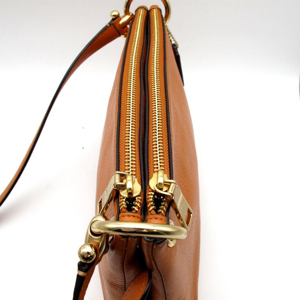 COACH コーチ ショルダーバッグ 斜め掛け 表ロゴ レザー オレンジ レディース 76645