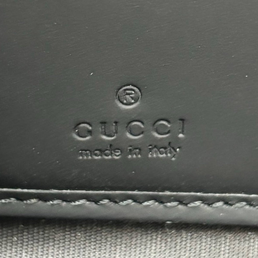 グッチ 771421 GGラバーエフェクト シグネチャー レザー ブラック 黒 エンボス 型押し シンプル メンズ GUCCI 長財布 ジッピーウォレット