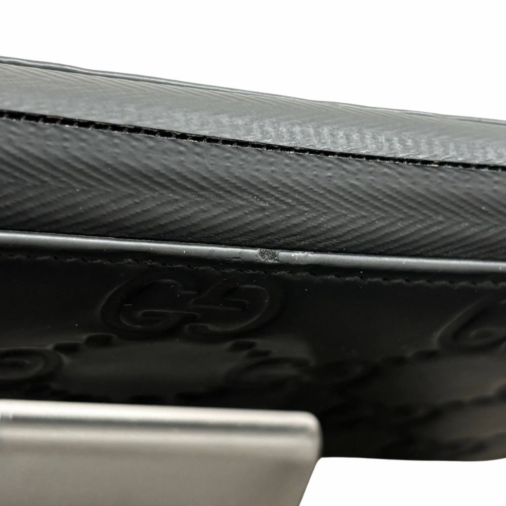 グッチ 771421 GGラバーエフェクト シグネチャー レザー ブラック 黒 エンボス 型押し シンプル メンズ GUCCI 長財布 ジッピーウォレット
