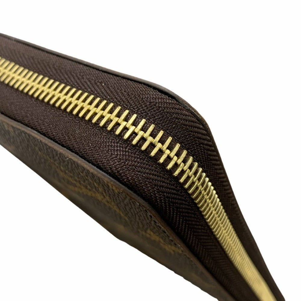 ルイ・ヴィトン 長財布 モノグラム M41895 ジッピー・ウォレット RFID内蔵 フューシャ ゴールド金具 ブラウン PVC レザー シンプル レディース 未使用品