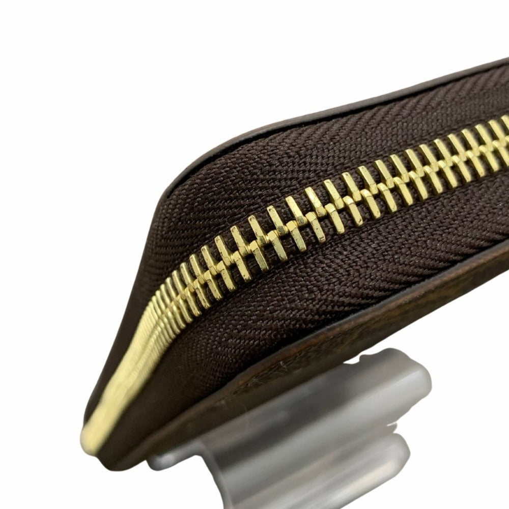 ルイ・ヴィトン 長財布 モノグラム M41895 ジッピー・ウォレット RFID内蔵 フューシャ ゴールド金具 ブラウン PVC レザー シンプル レディース 未使用品