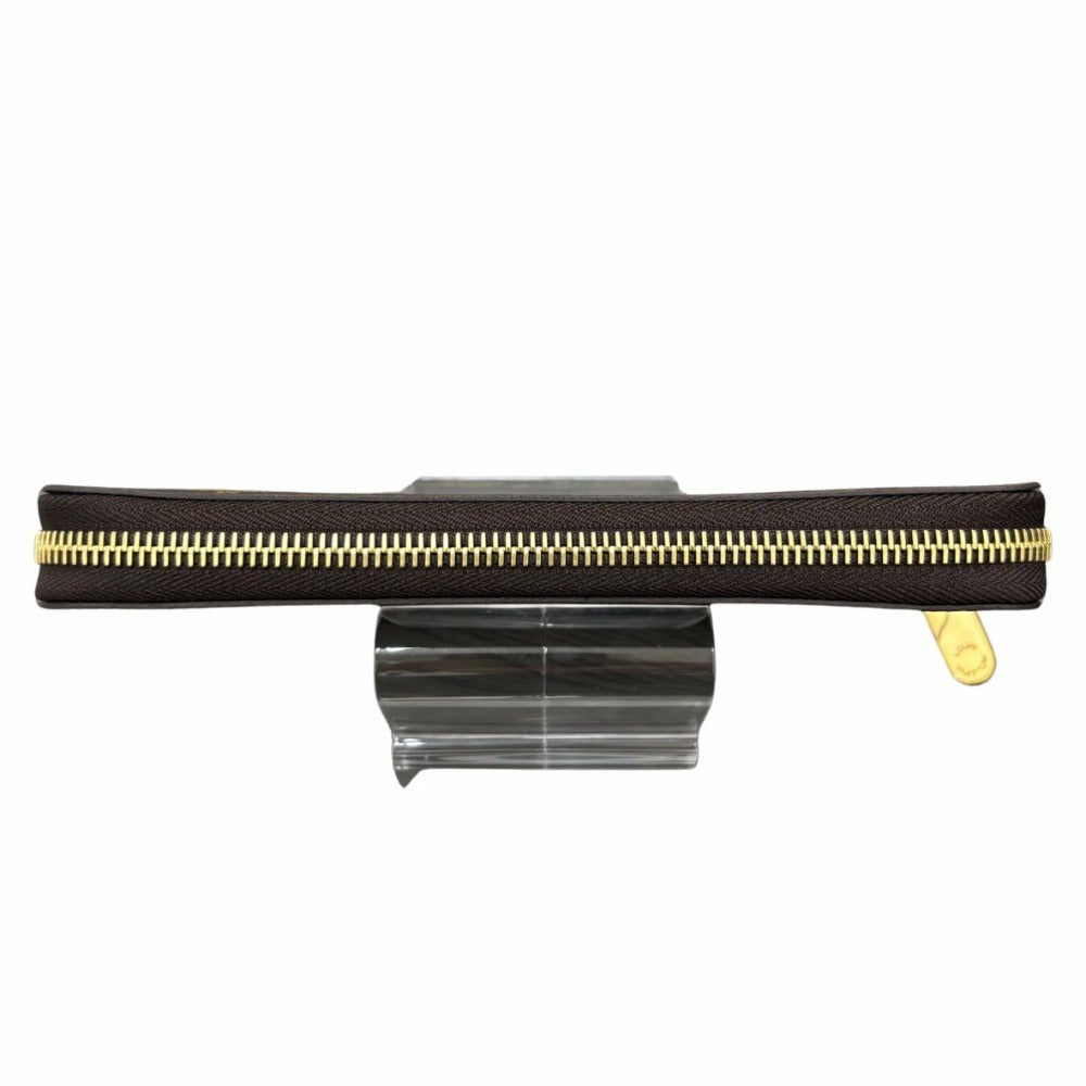 ルイヴィトン 長財布 モノグラム M41895 ジッピー・ウォレット RFID内蔵 フューシャ ゴールド金具 ブラウン PVC レザー シンプル レディース 未使用品 LOUIS VUITTON